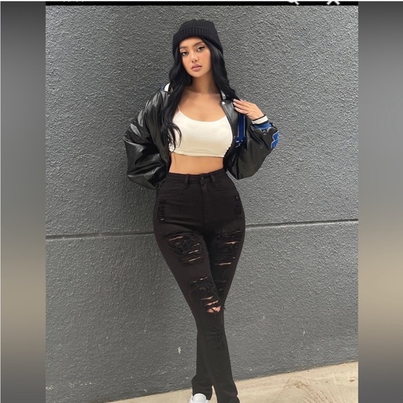 Black ripped skinny jeans. - Picture 1 of 2